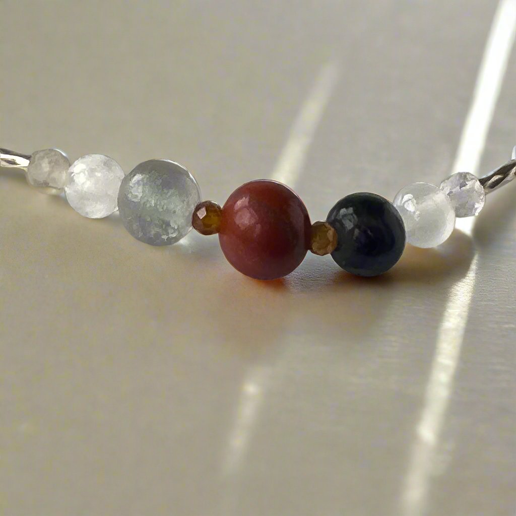 Aquarius Birthstone Healing Crystal bracelet for Confidence and Self-esteem showing Jasper, Fluorite and Garnet