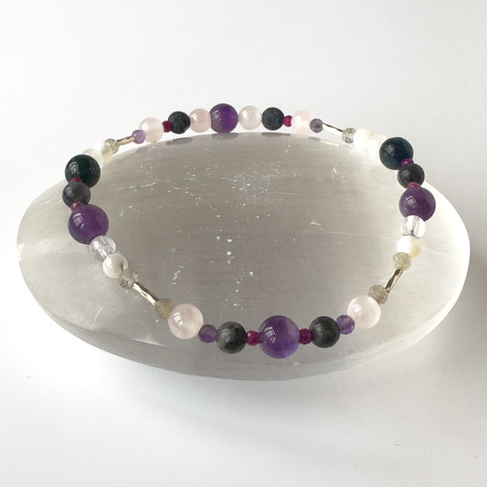 Healing crystal bracelet of Amethyst, Sugilite, Moonstone, Labradorite, Azurite, Rose Quartz, Selenite, Clear Quartz and Lava Stone