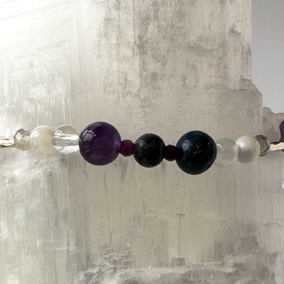Aquarius Birthstone Healing Crystal bracelet for Grief & Loss support showing Amethyst, Sugilite, Moonstone, Labradorite, Azurite, Selenite and Clear Quartz