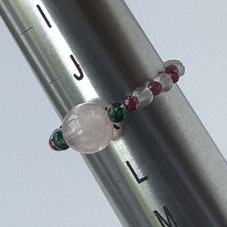 Aquarius Birthstone Healing Crystal ring for Love and Compassion on mandrel showing size as K