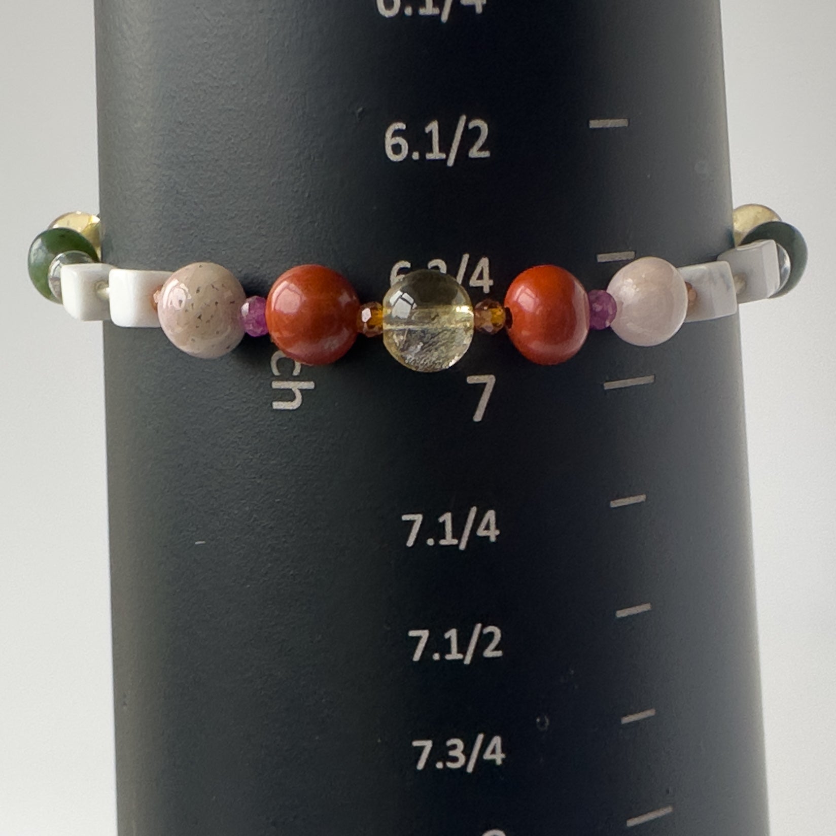 Aries Birthstone Healing Crystal bracelet for Love and Compassion on mandrel showing size as 6.75 inches