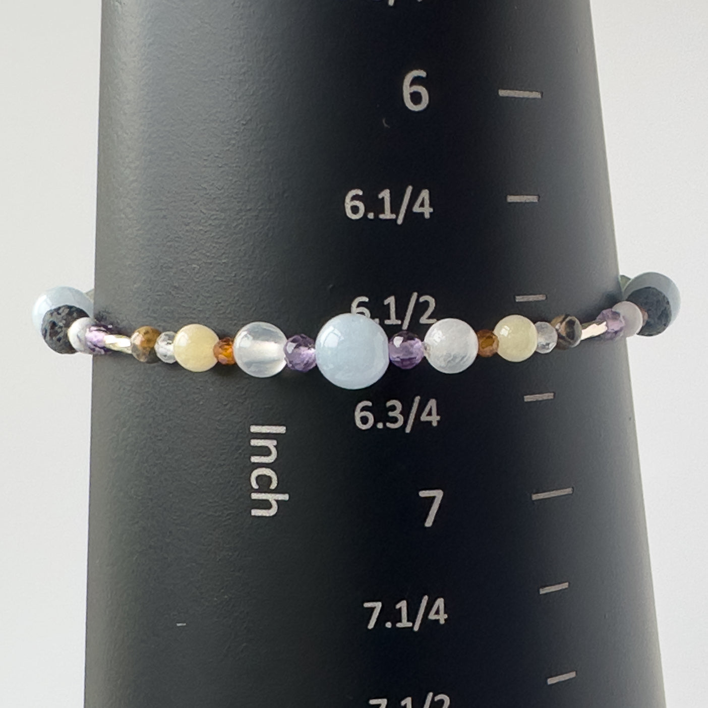 Aries Birthstone Healing Crystal bracelet for Calm & Stress relief on mandrel showing size as approx 6.5 inches