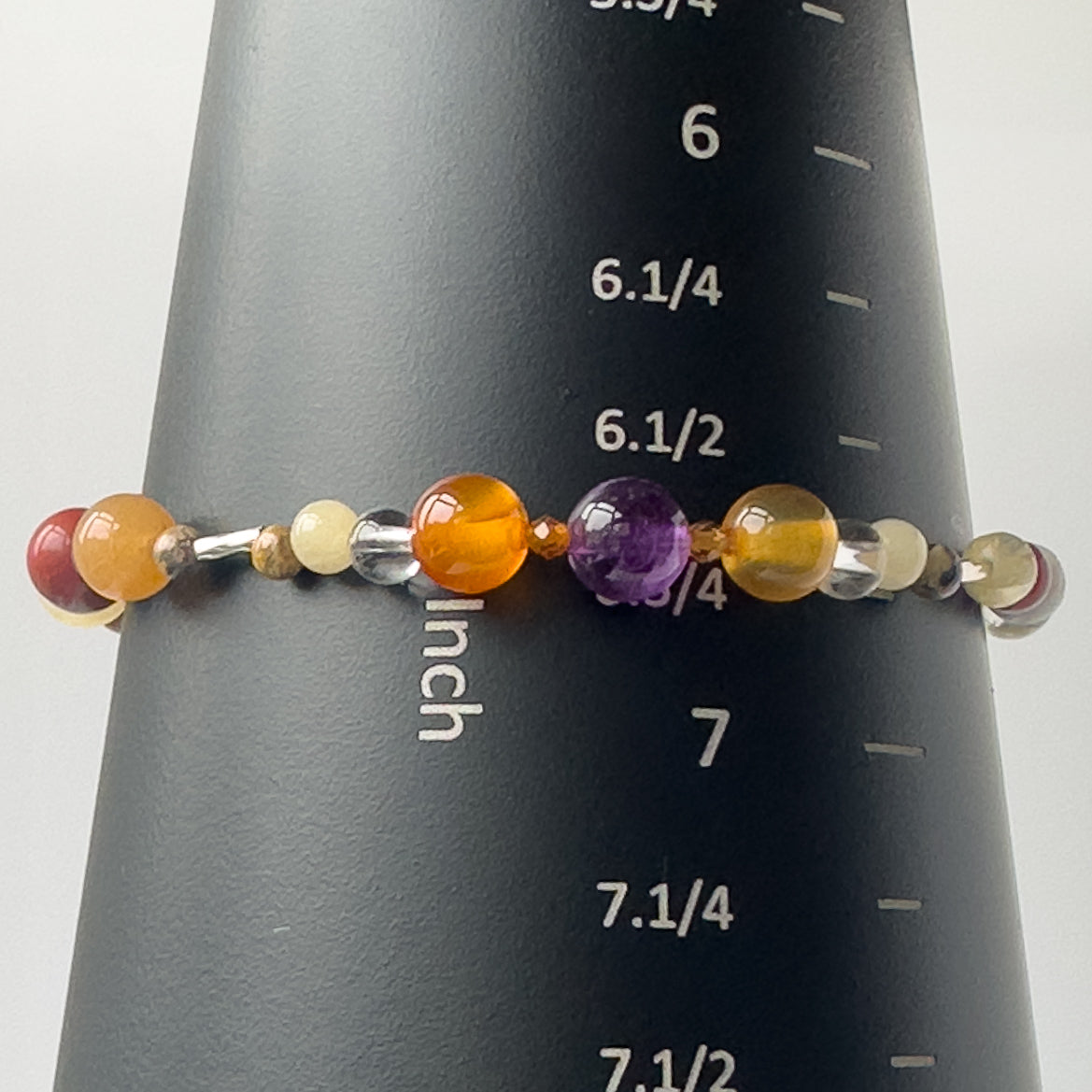 Aries birthstone Healing Crystal bracelet for Determination & Willpower on mandrel showing size as 6.75 inches