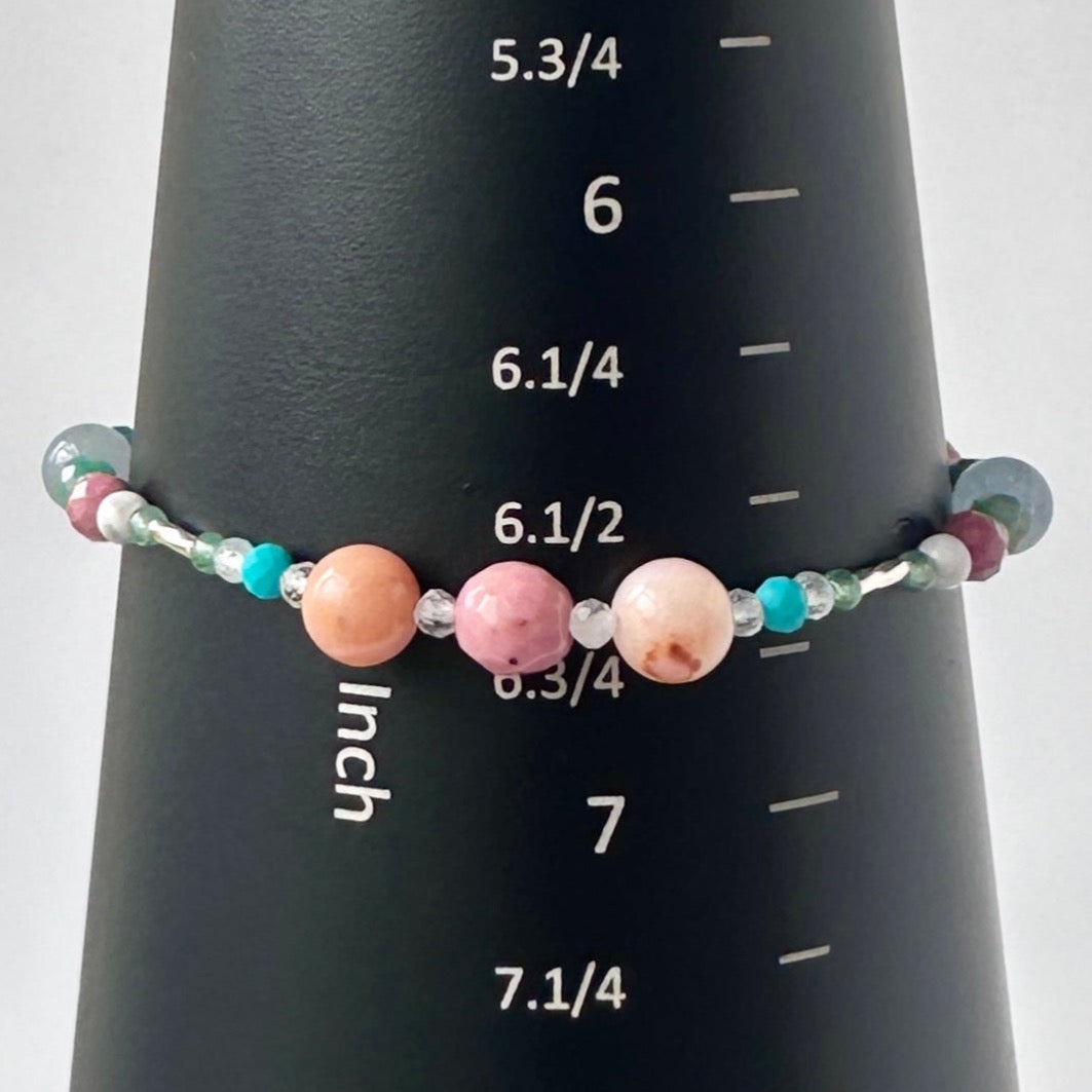 Cancer Birthstone Healing Crystal bracelet for Calm & Anxiety Relief on a mandrel showing size as 6.5 inches