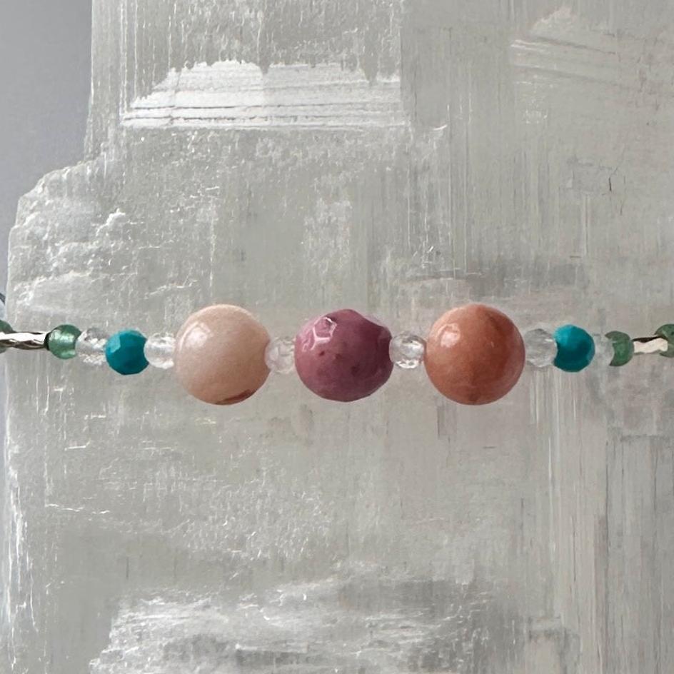 Cancer Birthstone Healing Crystal bracelet for Calm & Anxiety Relief showing Rhodonite, Turquoise, Aventurine, Selenite and Clear Quartz