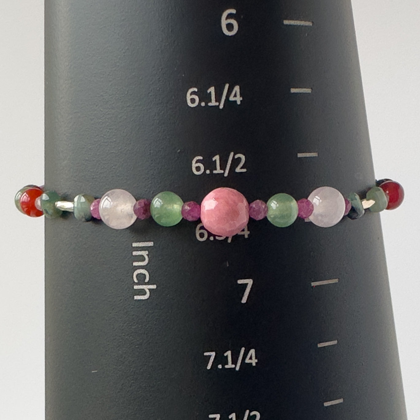 Cancer Birthstone Healing Crystal bracelet for Grief & Loss support on mandrel showing size of approx 6.75 inches