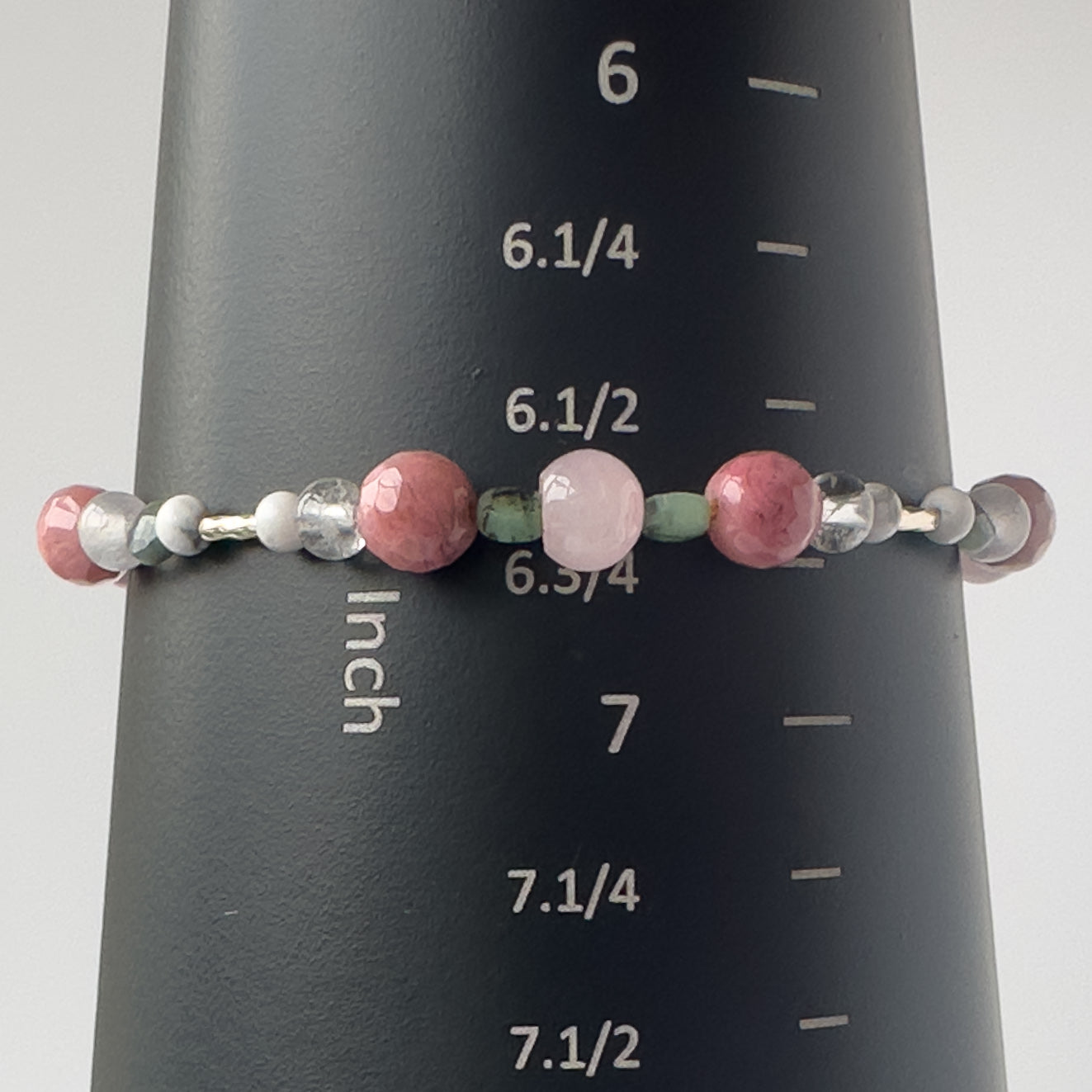 Cancer Birthstone Healing Crystal bracelet for Love and Compassion on mandrel showing size of 6.75 inches