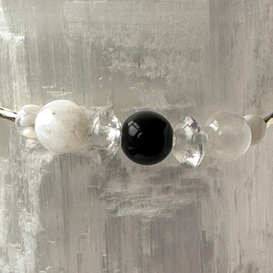 Cancer birthstone Healing Crystal bracelet for Calm & Stress relief showing Moonstone, Obsidian, Selenite and Clear Quartz