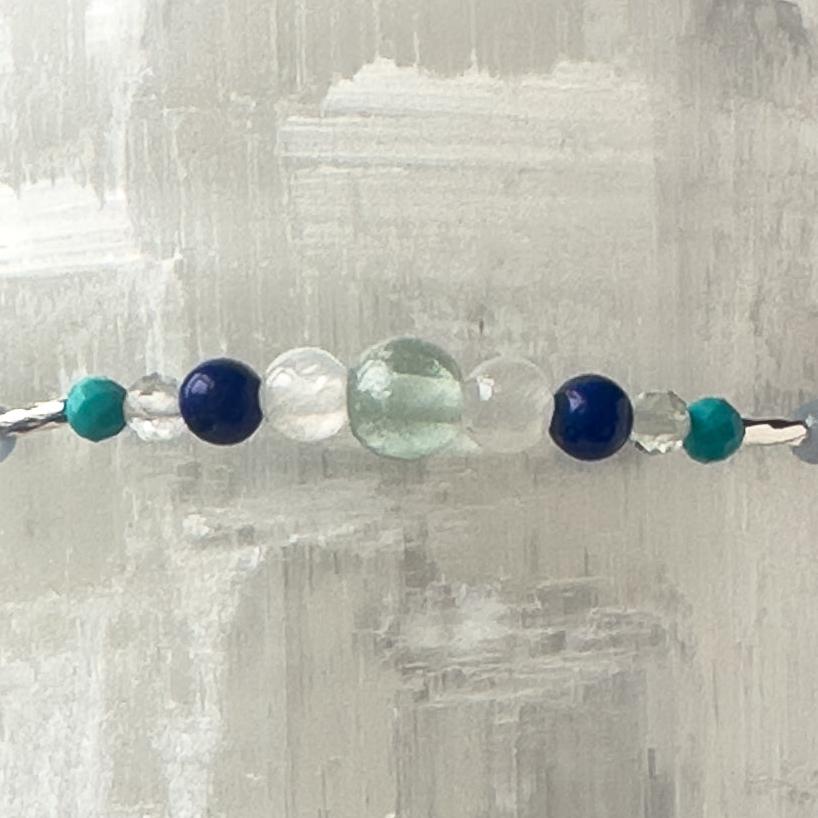 Capricorn Birthstone Healing Crystal bracelet for Calm & Anxiety Relief showing Turquoise, Lapis Lazuli, Fluorite and Selenite