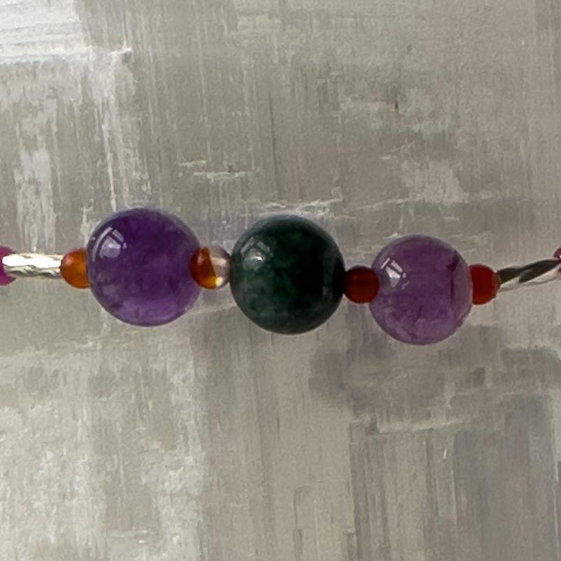 Capricorn Birthstone Healing Crystal bracelet for Grief & Loss support showing Amethyst, Carnelian and Azurite