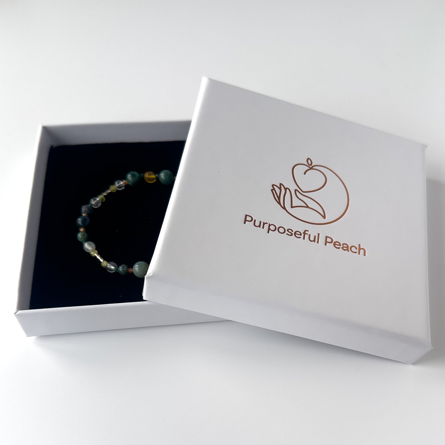 Capricorn Healing Crystal bracelet for Love in branded Purposeful Peach box