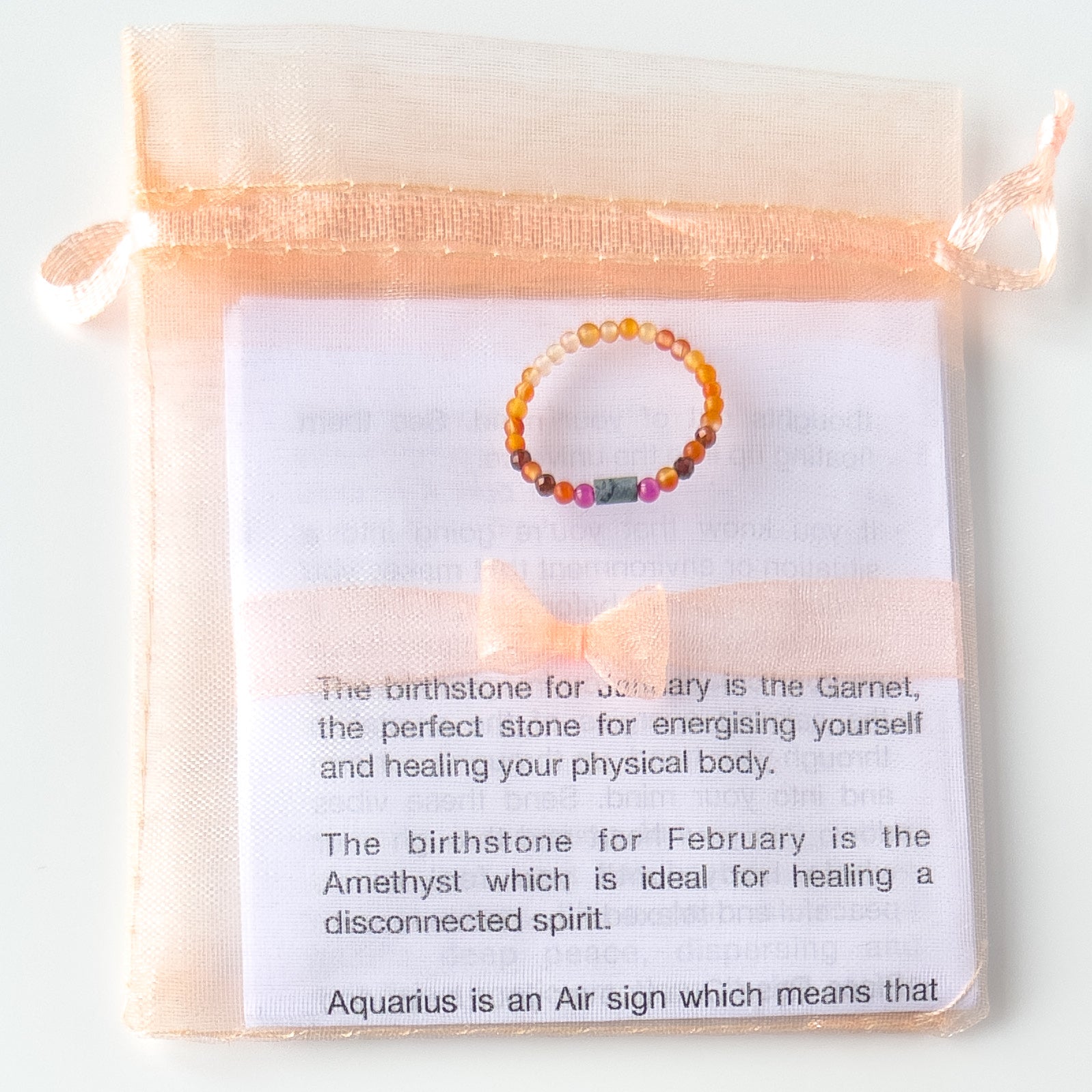 Capricorn birthstone Healing Crystal ring for Courage of Snowflake Obsidian, Ruby, Garnet and Carnelian in packaging