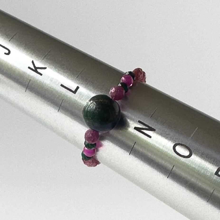 Love Healing Crystal birthstone ring for Sagittarius or Capricorn on mandrel showing size as M
