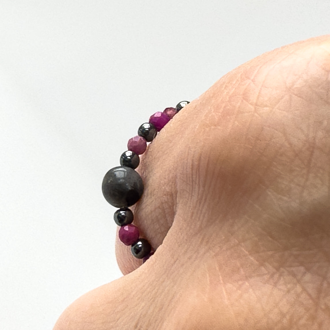 Close-up of Aquarius Birthstone Healing Crystal ring for Strength and Courage on a finger