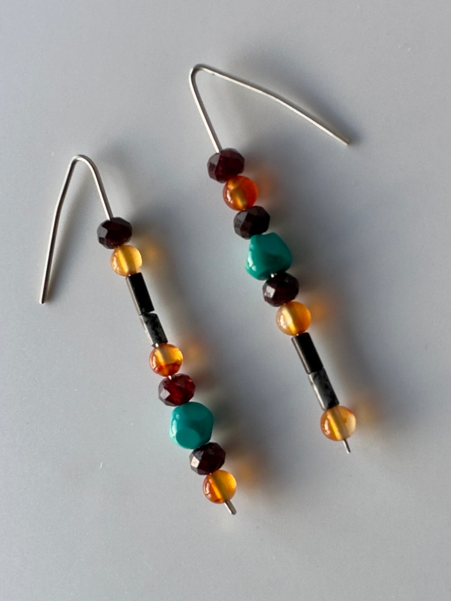 close-up of Capricorn birthstone Healing Crystal earrings for Strength and Courage