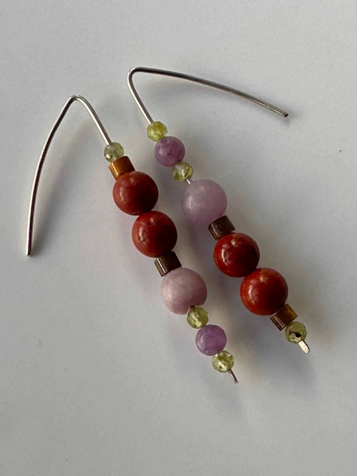 Close-up of Libra birthstone Healing Crystal earrings for Love and Compassion