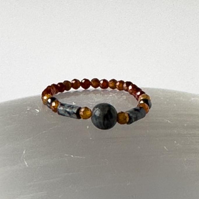 Close-up of Scorpio Birthstone Healing Crystal ring for Strength and Courage