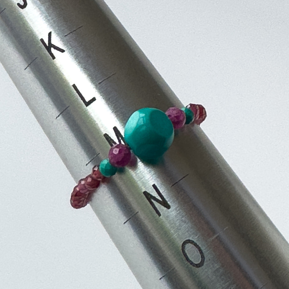 Courage Birthstone Healing Crystal Ring for Leo, Capricorn, Sagittarius & Scorpio on mandrel showing size of M