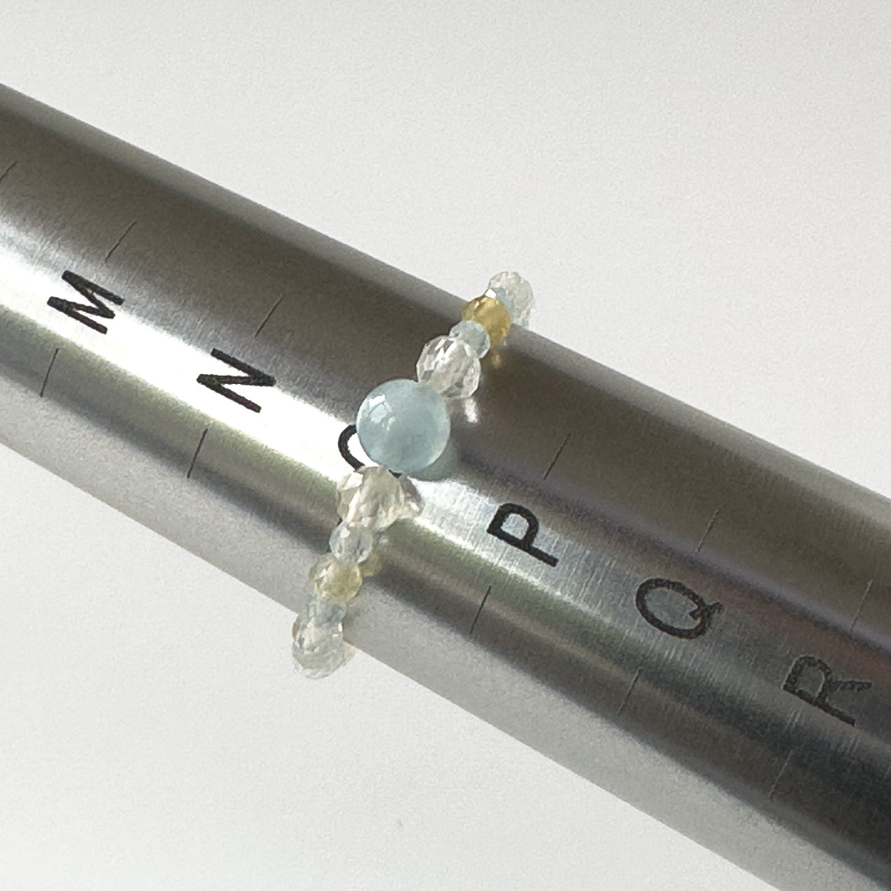 Courage Birthstone Healing Crystal ring for Gemini, Aries, Libra or Scorpio On mandrel showing size of O