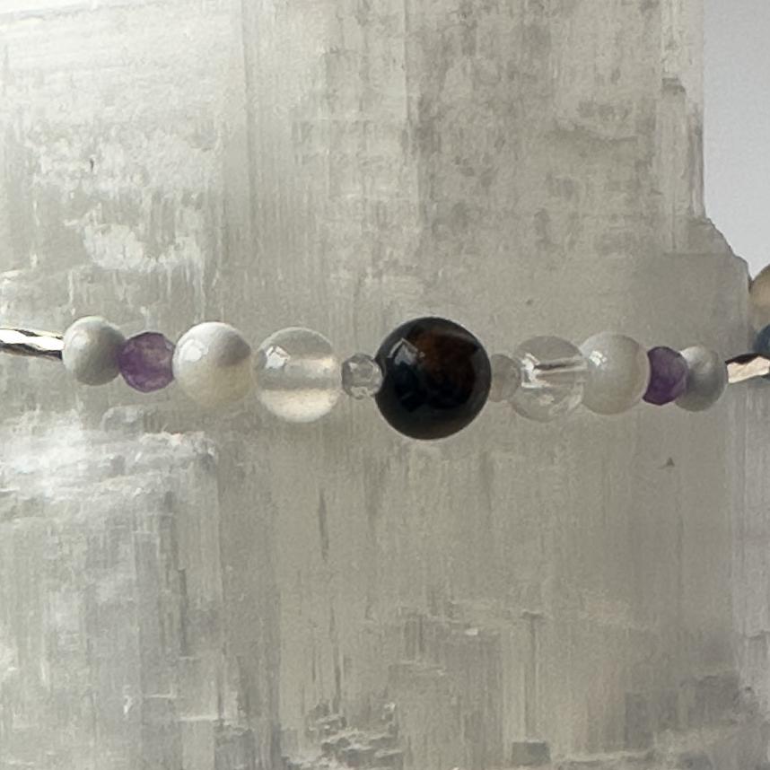 Gemini Birthstone Healing Crystal bracelet for Calm & Anxiety Relief showing Moonstone, Howlite, Blue Tiger’s Eye, Amethyst, Selenite and Clear Quartz