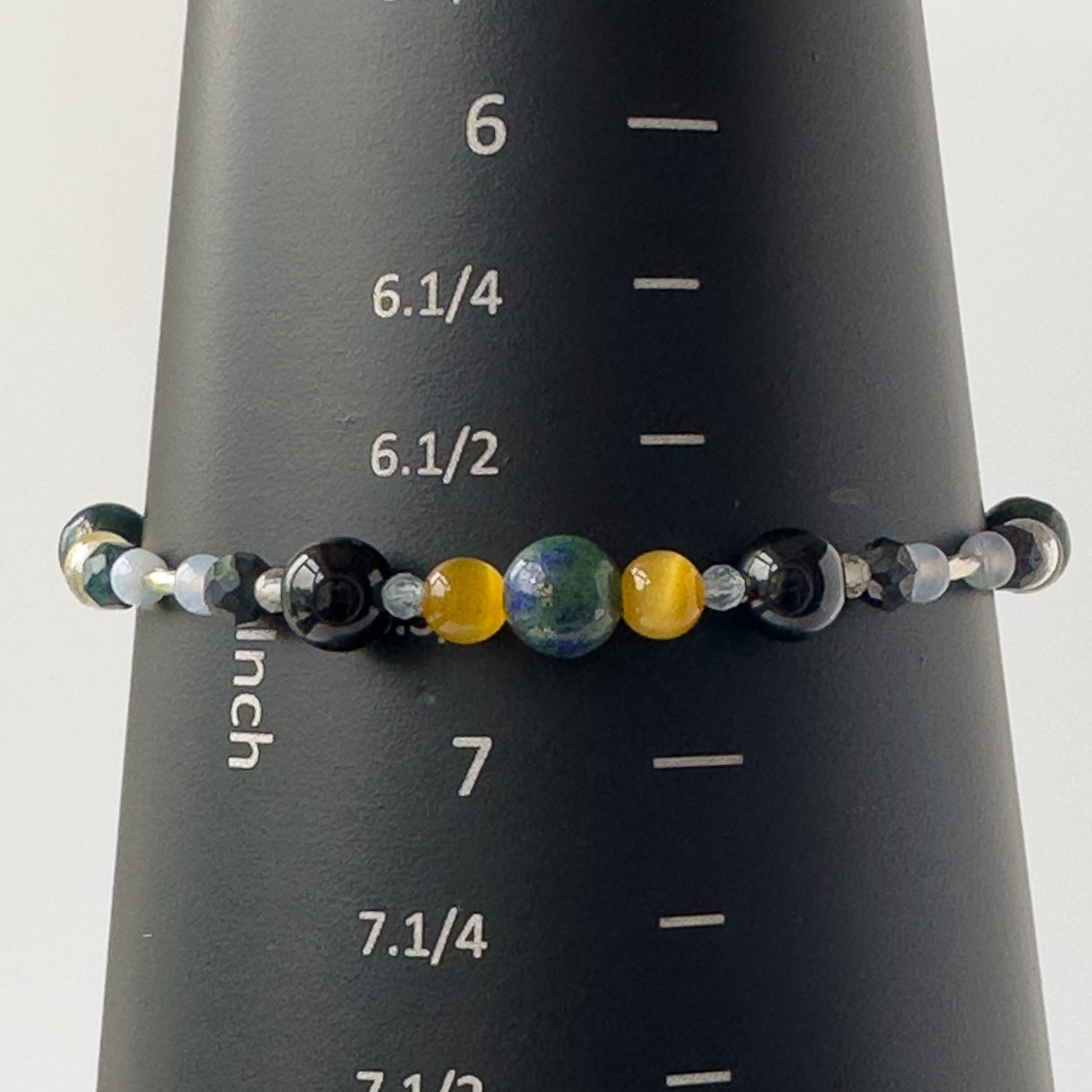 Gemini Birthstone Healing Crystal bracelet for Confidence and Self-esteem on a mandrel showing a size of 6.75 inches