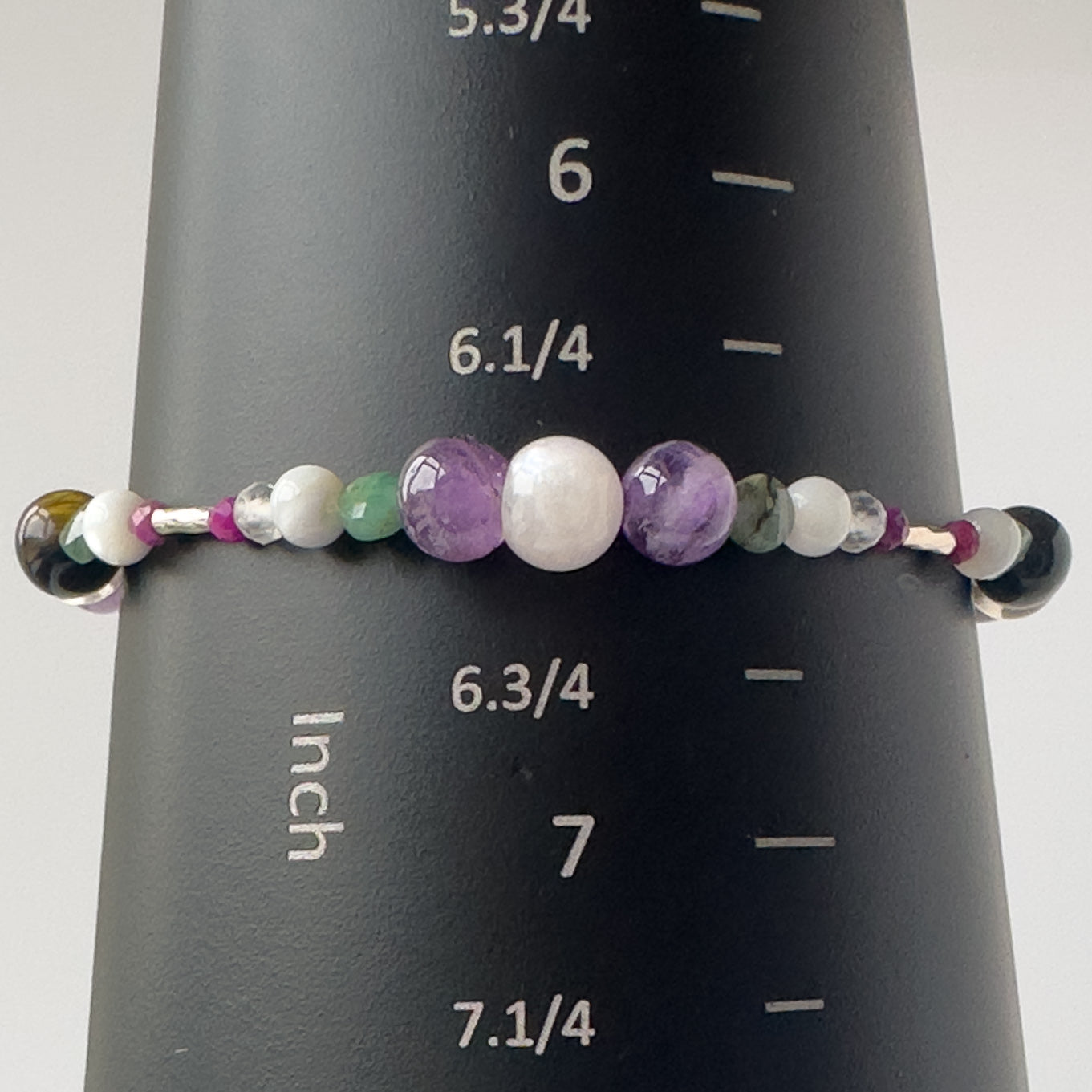 Gemini Birthstone Healing Crystal bracelet for Grief & Loss support on mandrel showing a size of 6.5 inches