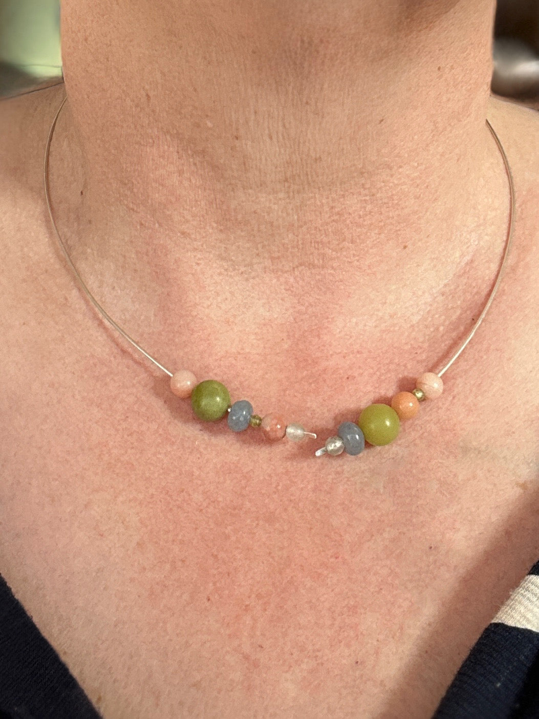 Sterling silver and healing crystal necklace with Leo birthstones for Stress on a neck