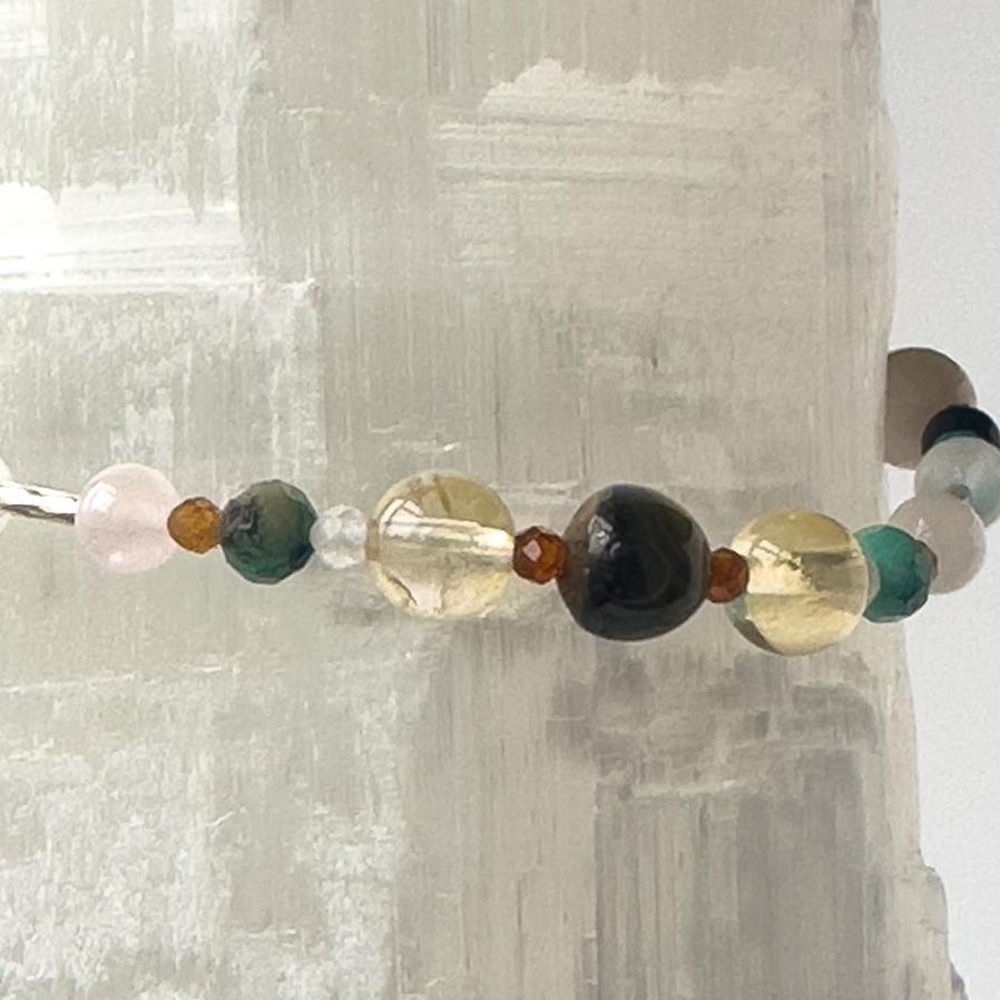 Leo Birthstone Healing Crystal bracelet for Calm & Anxiety Relief showing Blue Tiger’s Eye, Rose Quartz, Citrine, Garnet and Chrysocolla
