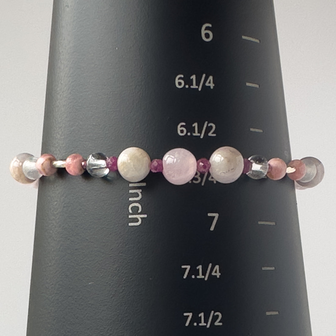 Leo birthstone Healing Crystal bracelet for Love and Compassion on mandrel showing size as 6.75 inches