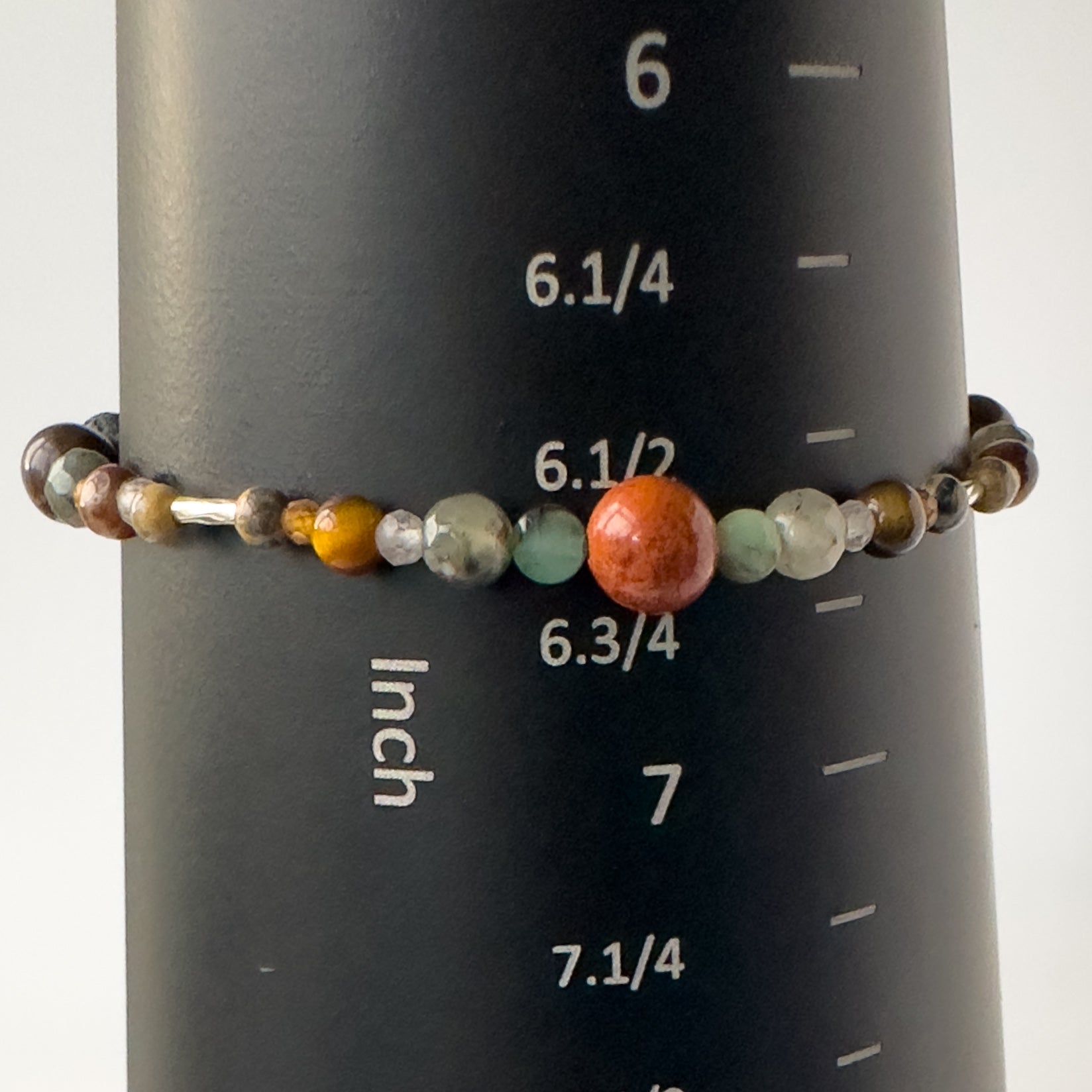 Leo Birthstone Healing Crystal bracelet for Calm & Stress relief on mandrel showing size as approx 6.5 inches
