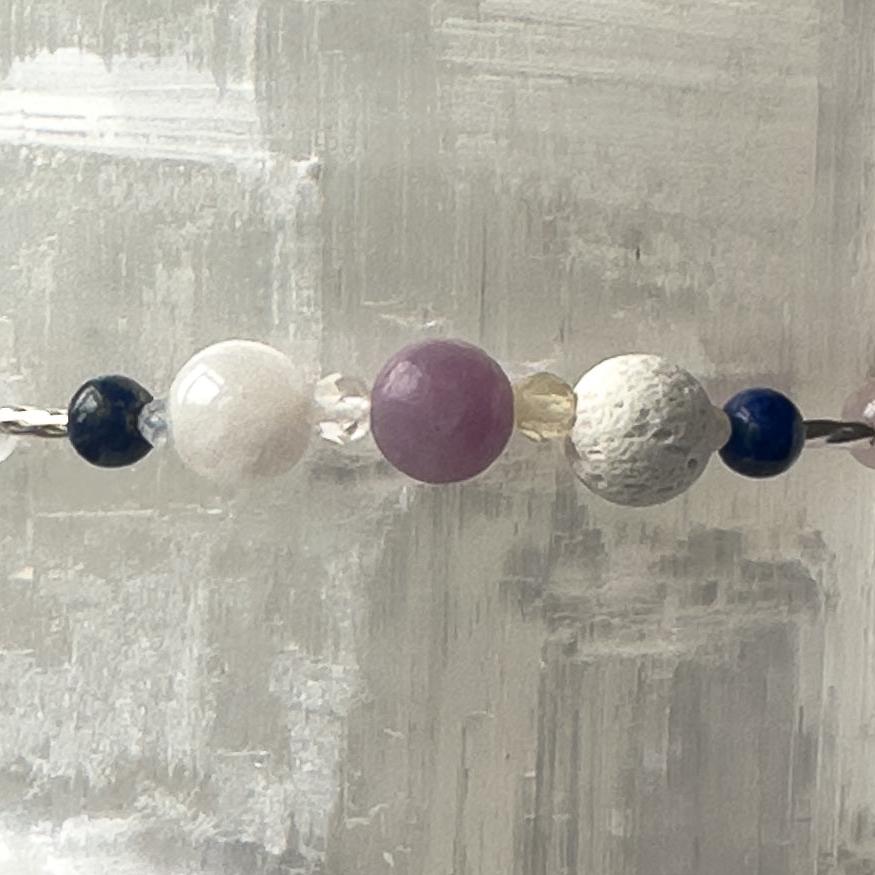 Libra Birthstone Healing Crystal bracelet for Calm & Anxiety Relief showing Lapis Lazuli, Citrine, Lepidolite and Moonstone