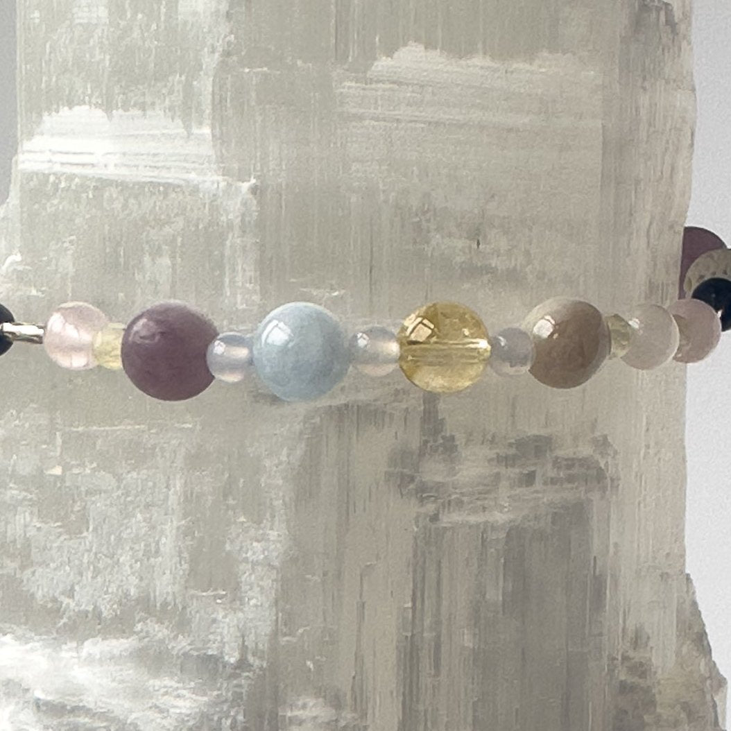 Libra Birthstone Healing Crystal bracelet for Calm & Anxiety Relief showing Rose Quartz, Aquamarine, Citrine, Blue Lace Agate and Lepidolite