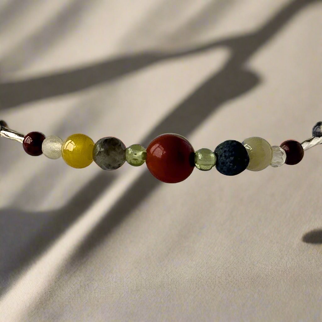 Libra Birthstone Healing Crystal bracelet for Confidence and Self-esteem showing Red Jasper, Peridot and Lava Stone