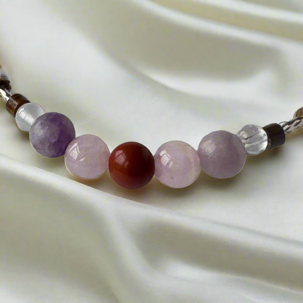 Libra birthstone Healing Crystal bracelet for Love and Compassion showing Rose Quartz, Red Jasper, Lepidolite, Tiger’s Eye, Selenite and Clear Quartz