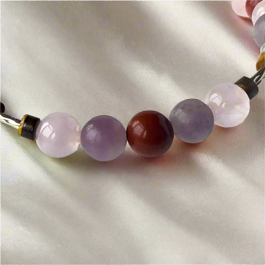 Libra Birthstone Healing Crystal bracelet for Love showing Rose Quartz, Red Jasper, Lepidolite and Tiger’s Eye