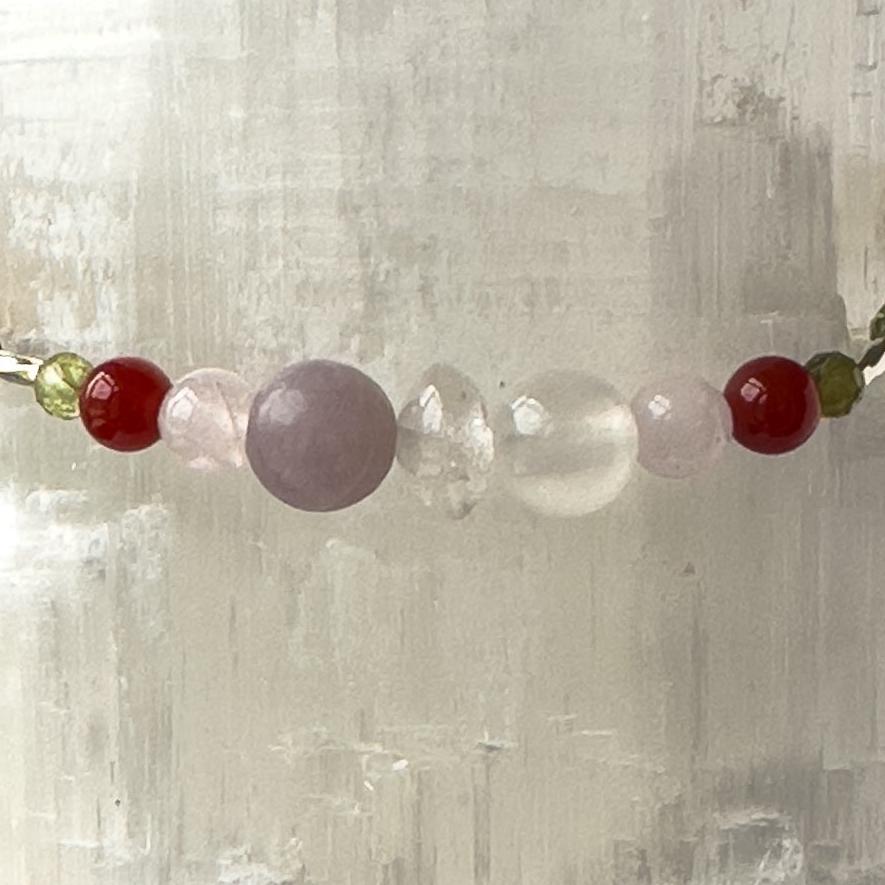 Libra Birthstone Healing Crystal bracelet for Determination & Willpower showing Peridot, Rose Quartz, Lepidolite, Carnelian, Selenite and Clear Quartz