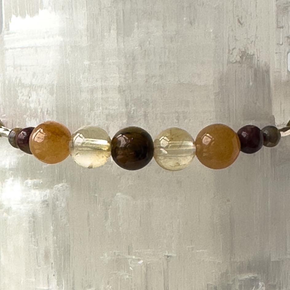 Libra Birthstone Healing Crystal bracelet for Determination & Willpower showing Tiger’s Eye, Citrine, Carnelian and Leopardskin Jasper