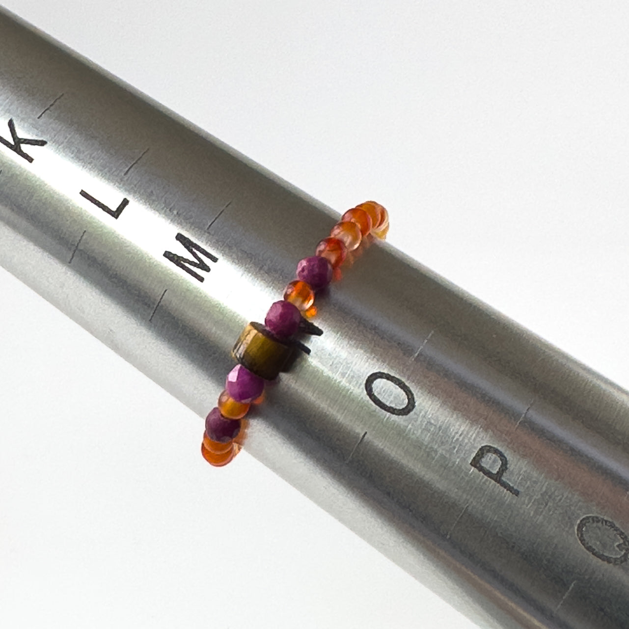 Libra birthstone Healing Crystal ring for Strength and Courage on mandrel showing size of N