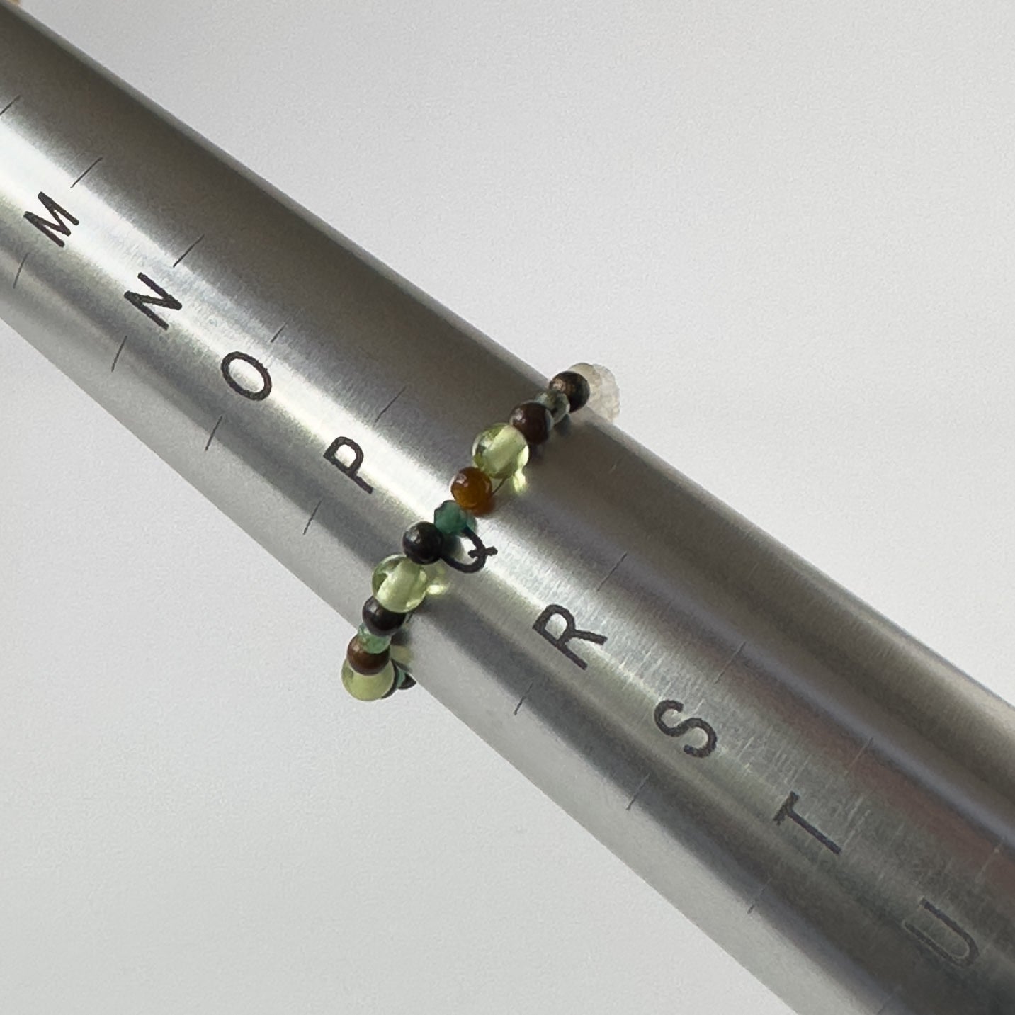 Love And Compassion Healing Crystal ring for Libra, Gemini, Leo or Pisces on mandrel showing size as Q