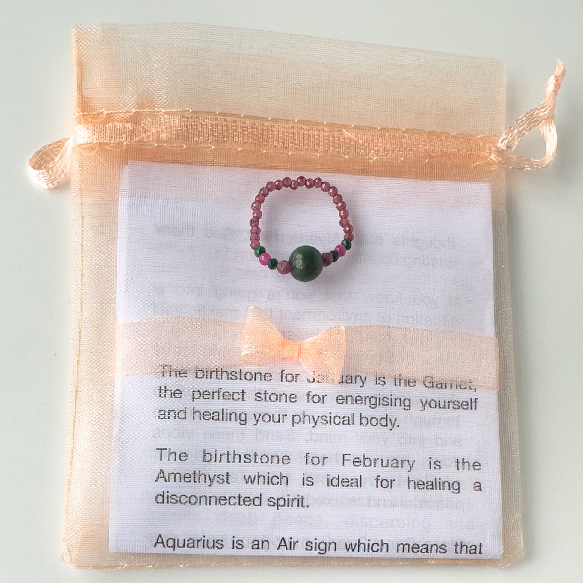 Love and Compassion Healing Crystal ring for Sagittarius or Capricorn with packaging