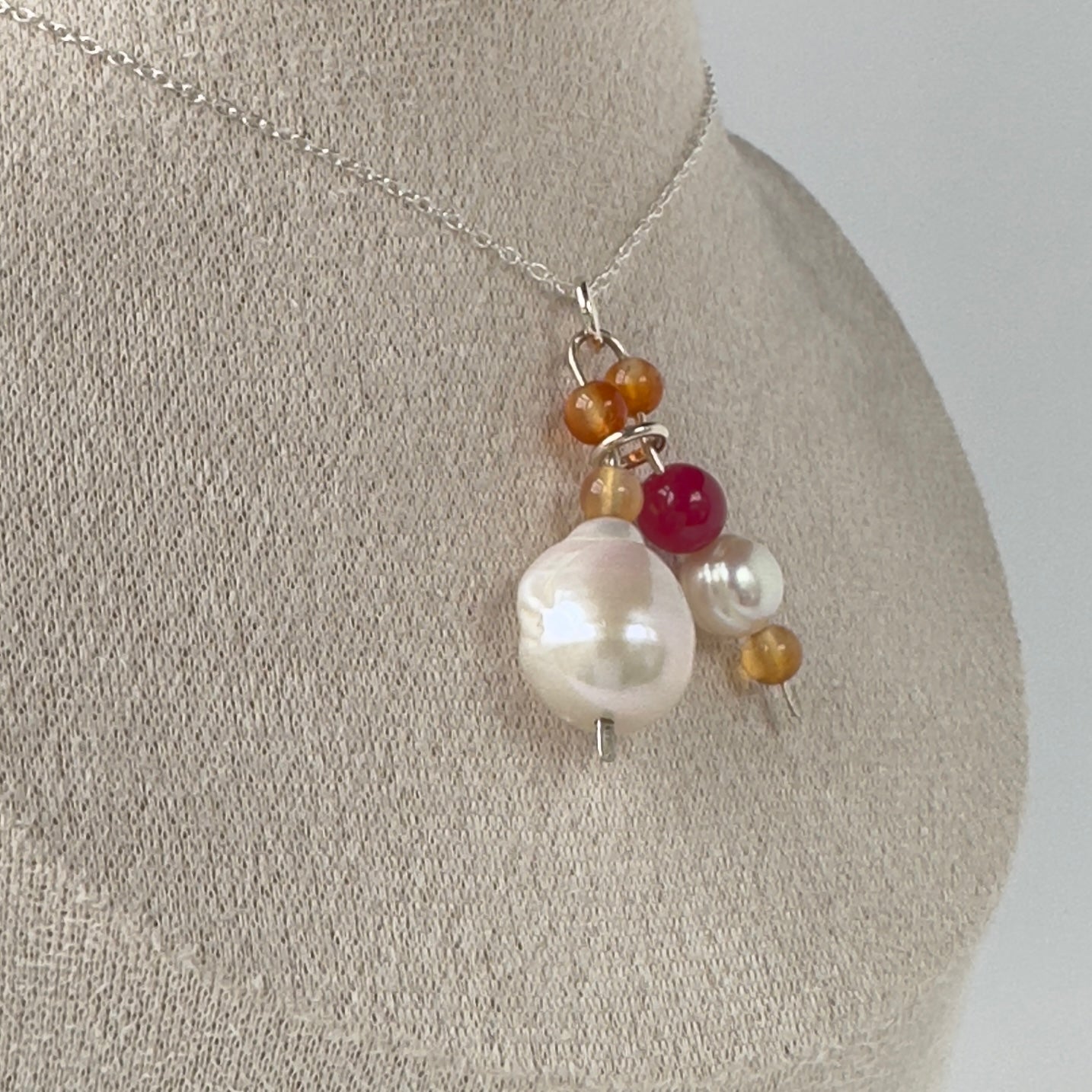 Necklace with pearls and beads on a mannequin bust