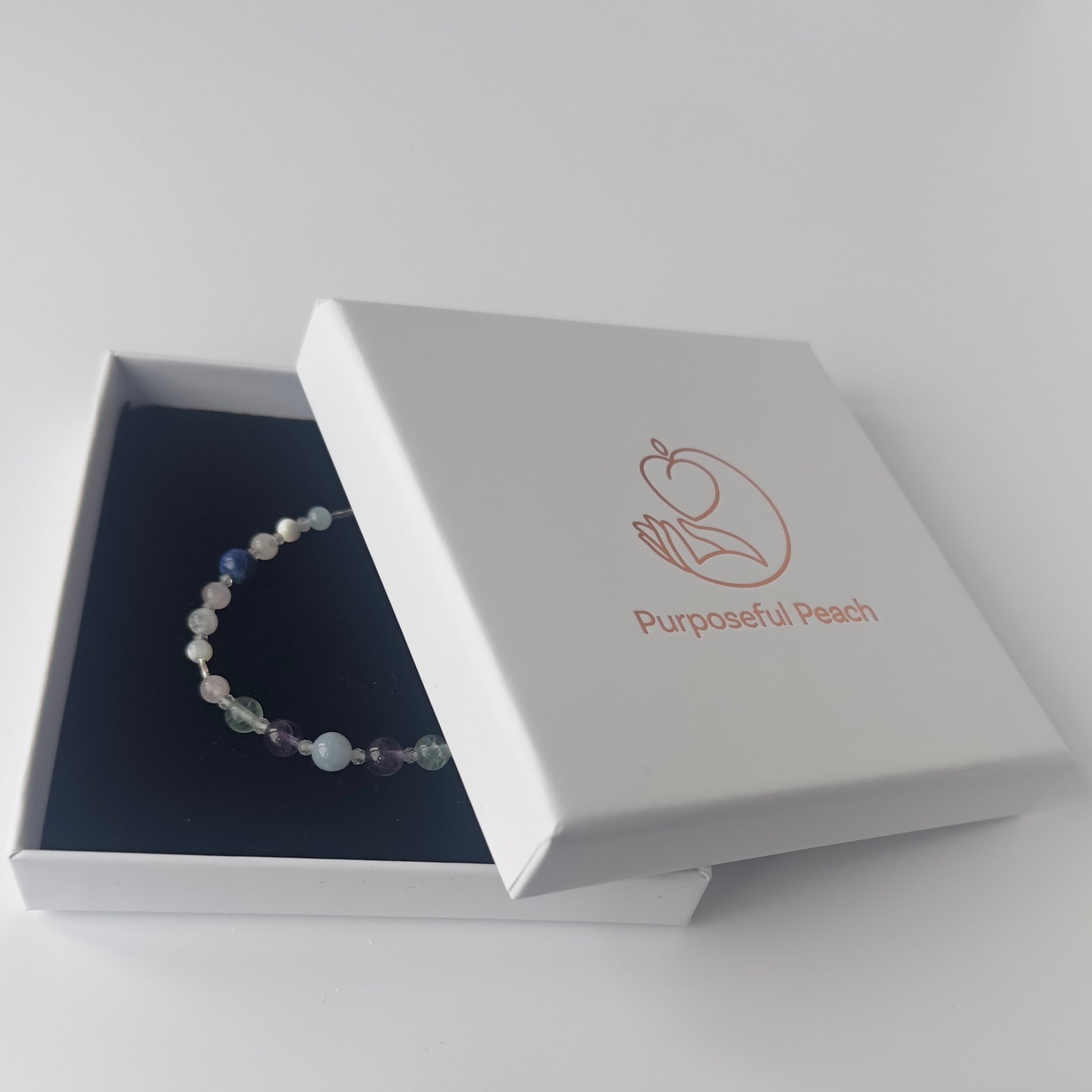 Aquarius Healing Crystal bracelet for Anxiety in branded Purposeful Peach  box