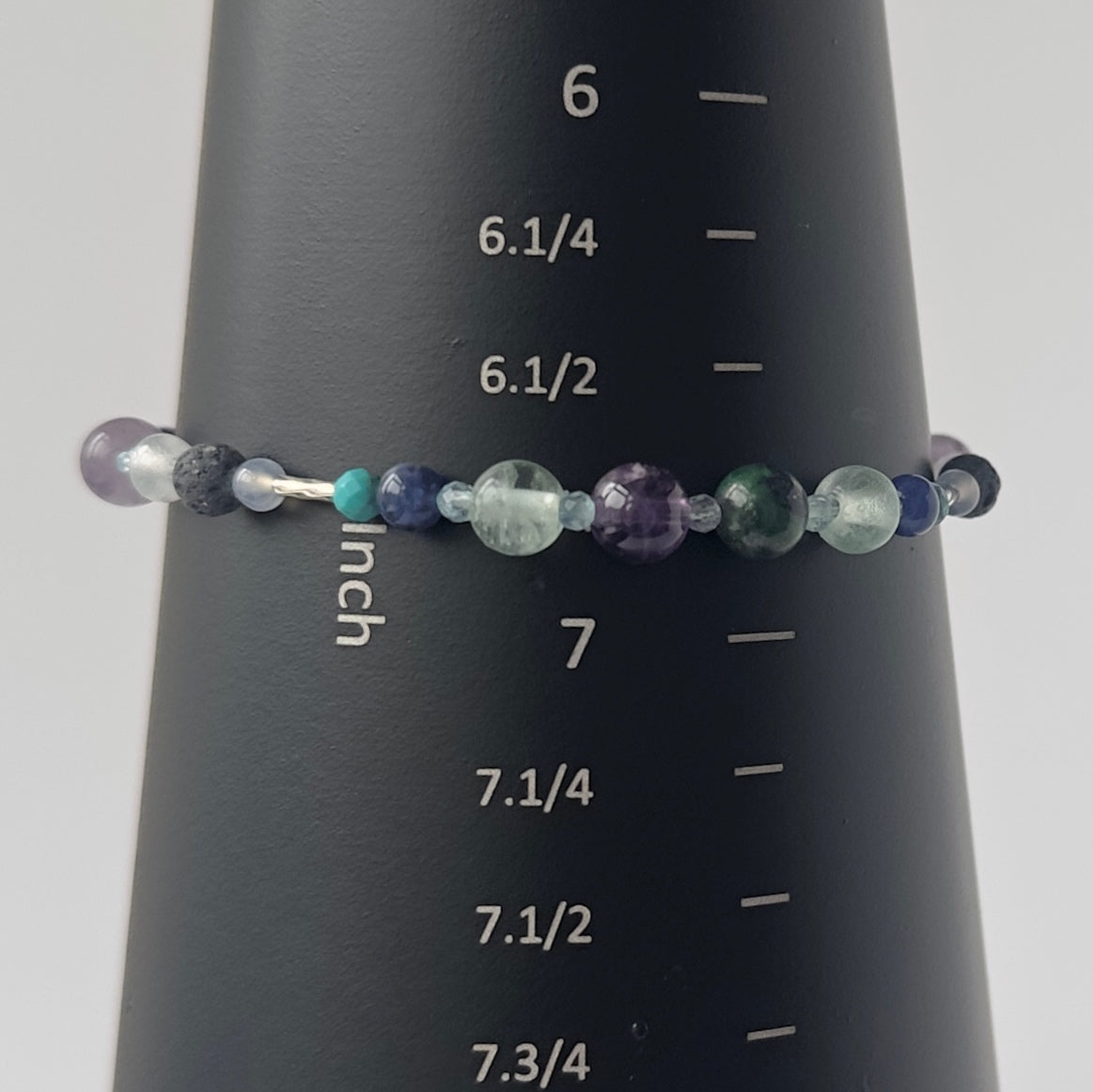 Sagittarius Birthstone Healing Crystal bracelet for Calm & Anxiety Relief on a mandrel showing a size of 6.75 inches