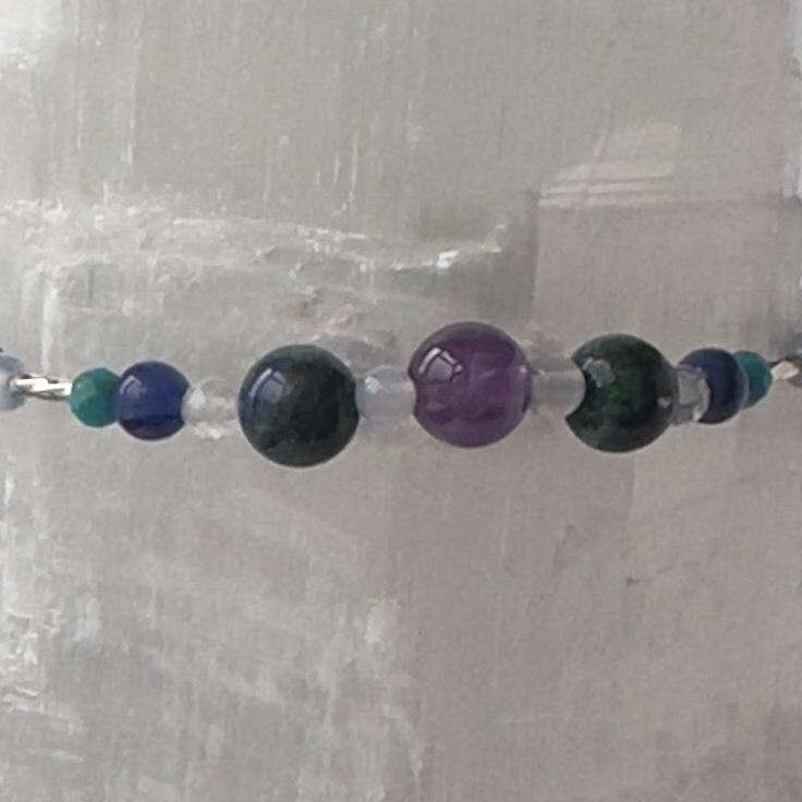 Sagittarius Birthstone Healing Crystal bracelet for Calm & Anxiety Relief showing Turquoise, Amethyst, Lapis Lazuli, Azurite, Sodalite and Blue Lace Agate
