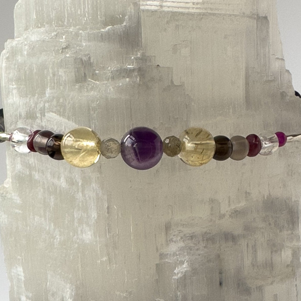 Sagittarius Birthstone Healing Crystal bracelet for Grief & Loss support showing Citrine, Amethyst, Labradorite, Ruby, Smoky Quartz, and Clear Quartz