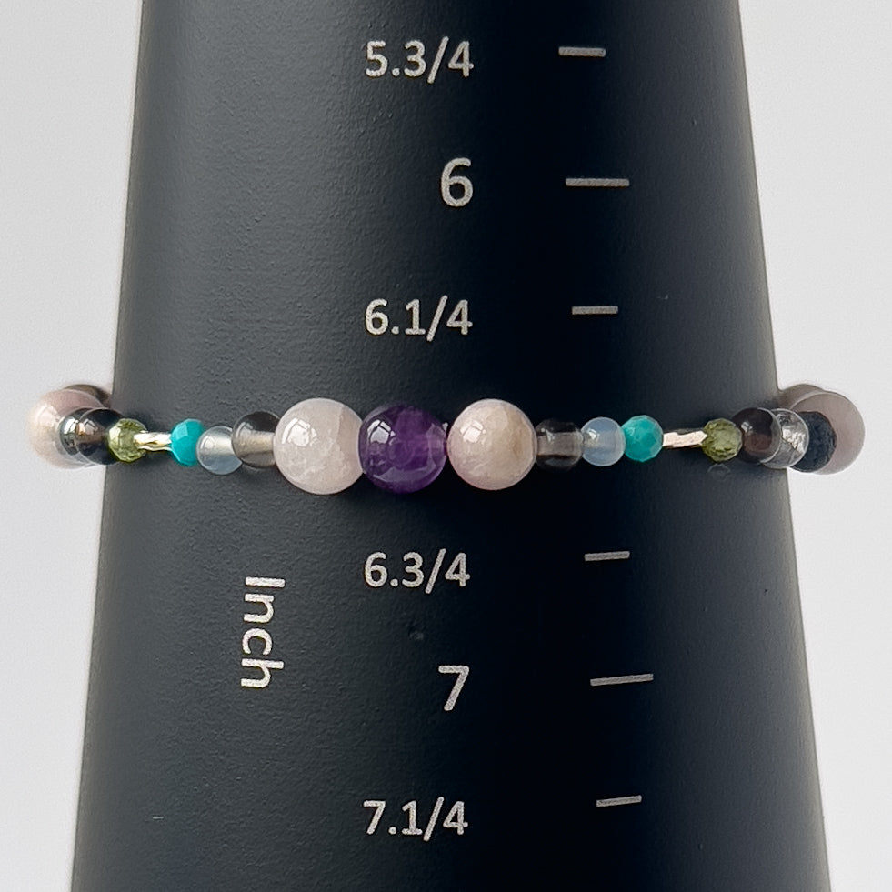 Scorpio birthstone Healing Crystal bracelet for Calm & Anxiety relief on a mandrel showing a size of 6.5 inches