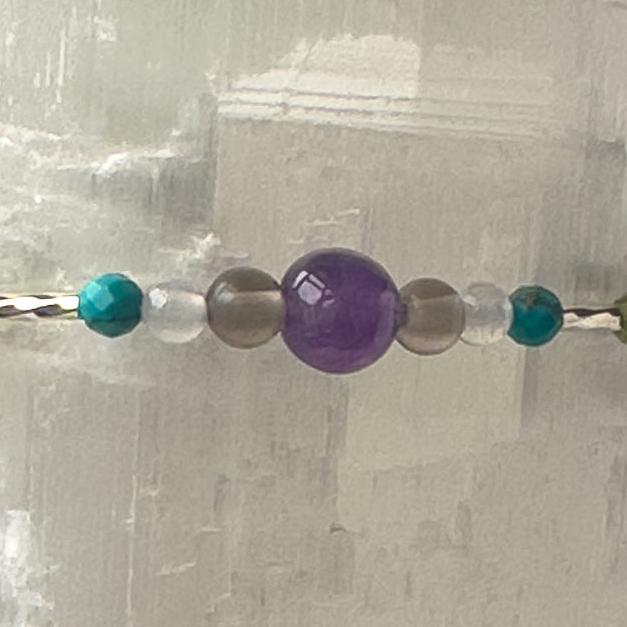 Scorpio Birthstone Healing Crystal bracelet for Calm & Anxiety Relief showing Turquoise, Blue Lace Agate, Amethyst and Smoky Quartz