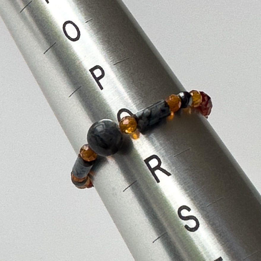 Scorpio Birthstone Healing Crystal ring for Courage on mandrel showing size of Q