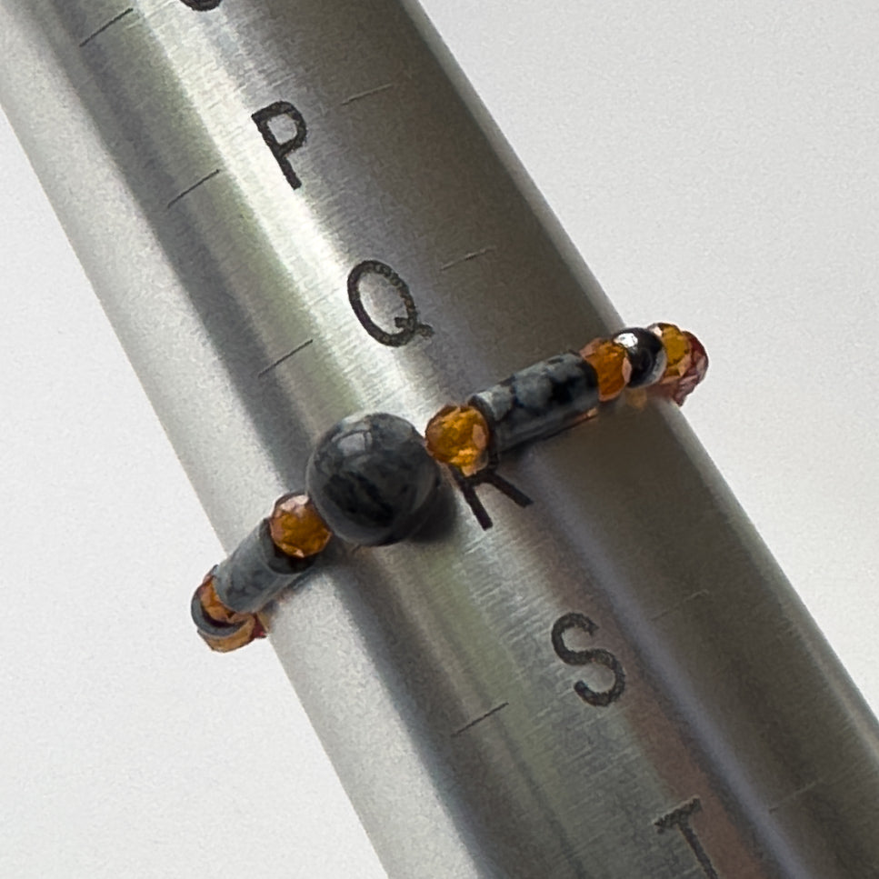 Scorpio Birthstone Healing Crystal ring for Courage on mandrel showing size of R