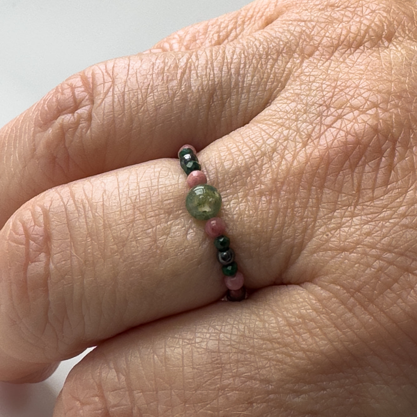 Scorpio birthstone Healing Crystal ring for Love and Compassion on finger